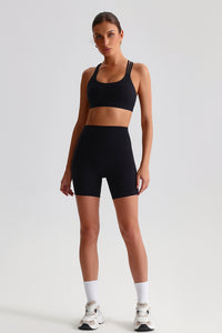 Women Naked Sensation Yoga Shorts Set: Cross-Back Bra + High-Waisted Sculpting Shorts