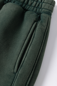 Water-washed and fleece-lined curved-blade pants.