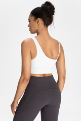 Bra with built-in chest padding and slanted shoulders