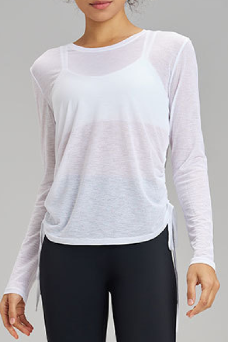 Women's side-seamed drawstring waist long-sleeved shirt.