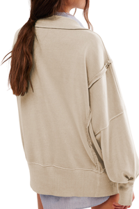 Loose-fitting, flared-neck hoodie with a split design