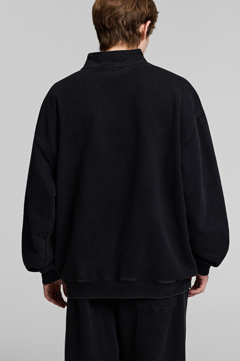 Collared, semi-zippered sweatshirt