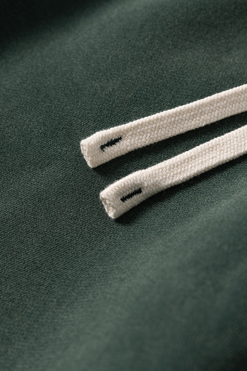 Water-washed and fleece-lined curved-blade pants.