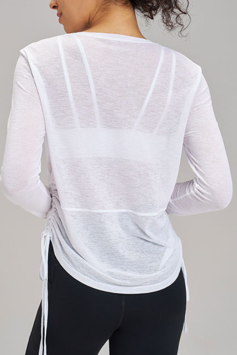 Women's side-seamed drawstring waist long-sleeved shirt.