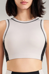 Women's color-blocked sleeveless sports bra.