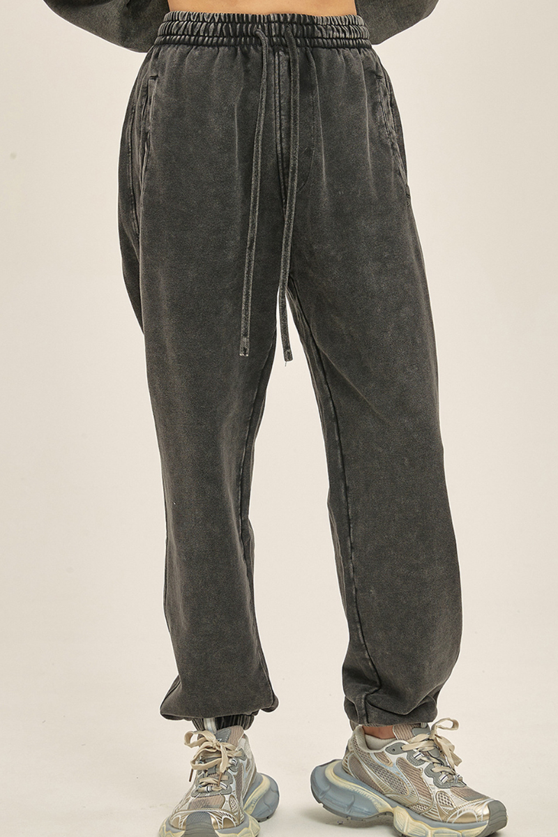 Wax-dyed, distressed, loose-fitting sweatpants