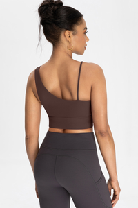 Bra with built-in chest padding and slanted shoulders