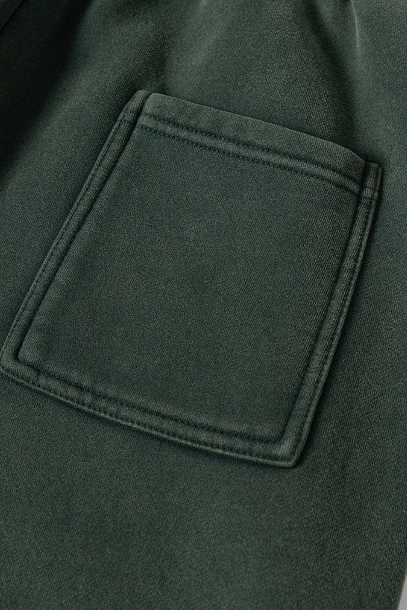 Water-washed and fleece-lined curved-blade pants.