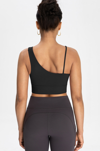 Bra with built-in chest padding and slanted shoulders