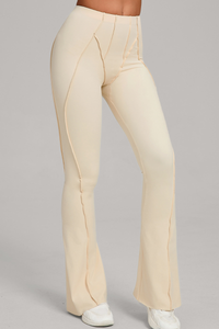 Wide-leg, snug, textured, and high-waisted flared pants