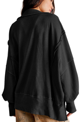Loose-fitting, flared-neck hoodie with a split design