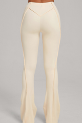 Wide-leg, snug, textured, and high-waisted flared pants