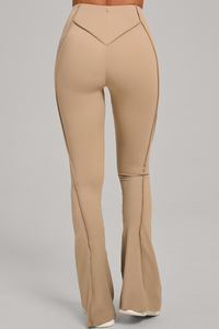 Wide-leg, snug, textured, and high-waisted flared pants