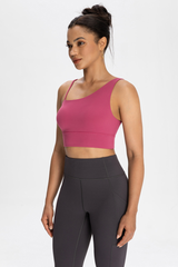 Bra with built-in chest padding and slanted shoulders