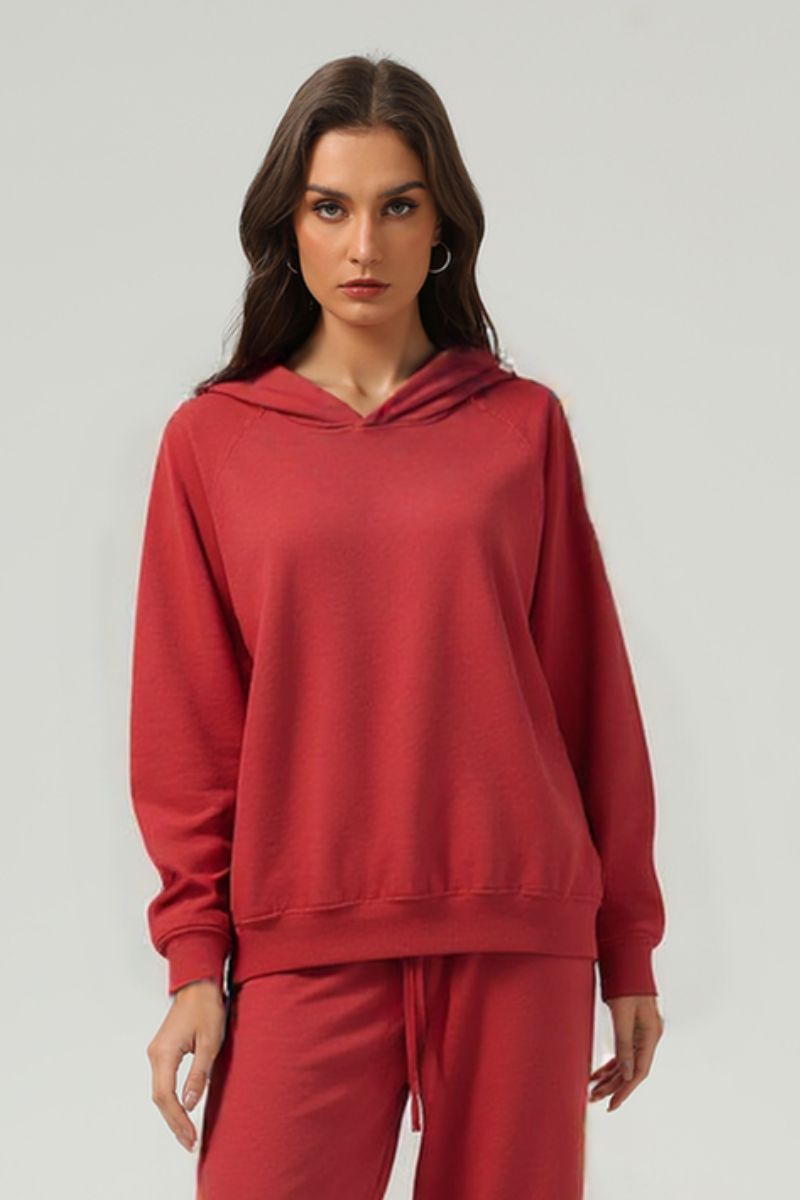 Washed raglan sleeve hooded sweatshirt