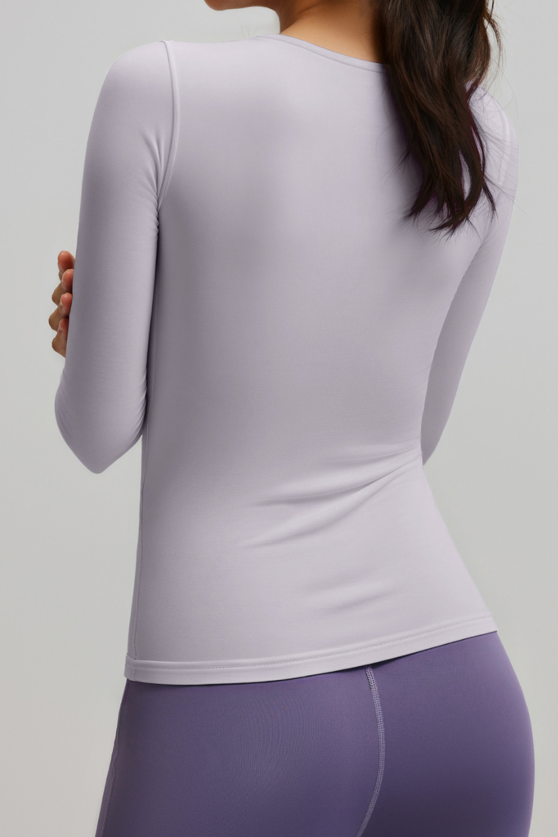Round-necked, form-fitting long-sleeved top