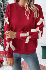 Round-necked, bow-style, red Christmas-themed sweatshirt