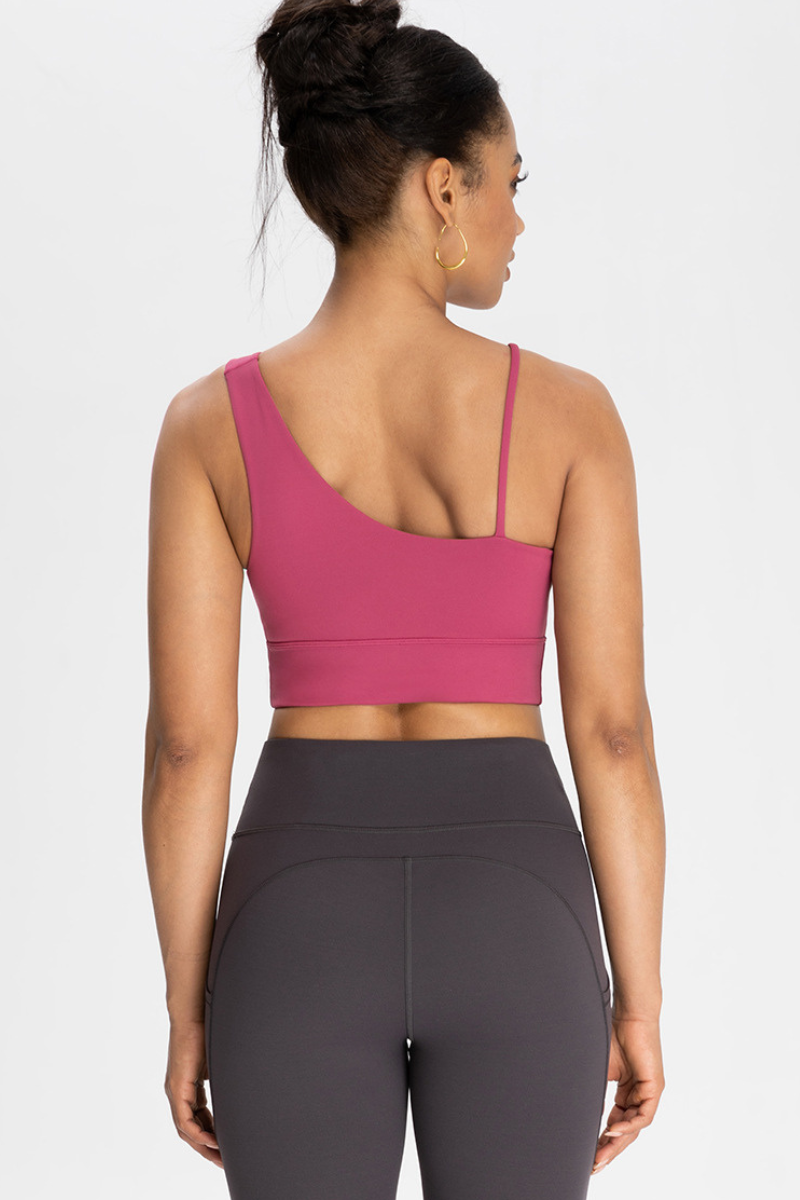 Bra with built-in chest padding and slanted shoulders