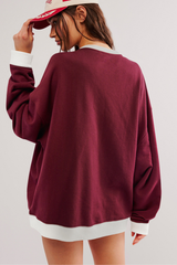 Contrasting-colored long-sleeved garment
