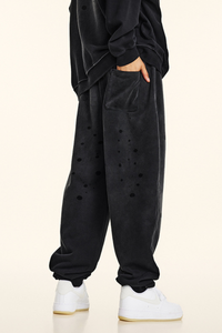 Men's vintage spray paint cuffed sweatpants.