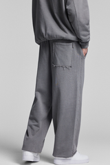 Faded, frayed-edged sweatpants