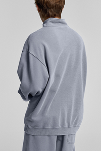 Collared, semi-zippered sweatshirt
