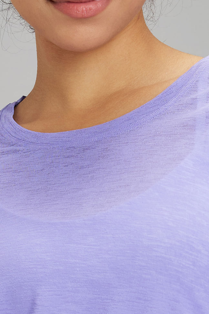 Women's side-seamed drawstring waist long-sleeved shirt.