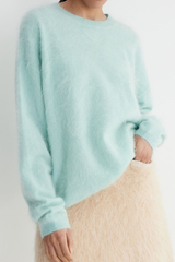 Round-necked plush knit sweater