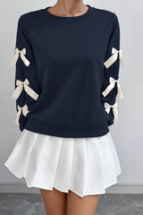 Round-necked, bow-style, red Christmas-themed sweatshirt