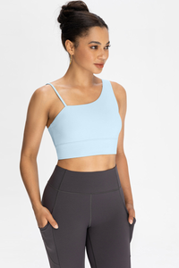 Bra with built-in chest padding and slanted shoulders