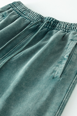 Wax-dyed, distressed, loose-fitting sweatpants