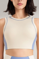 Women's color-blocked sleeveless sports bra.