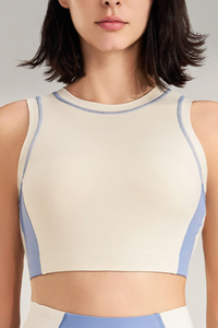 Women's color-blocked sleeveless sports bra.