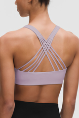 Cross-pattern shoulder strap sports bra