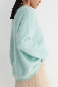 Round-necked plush knit sweater