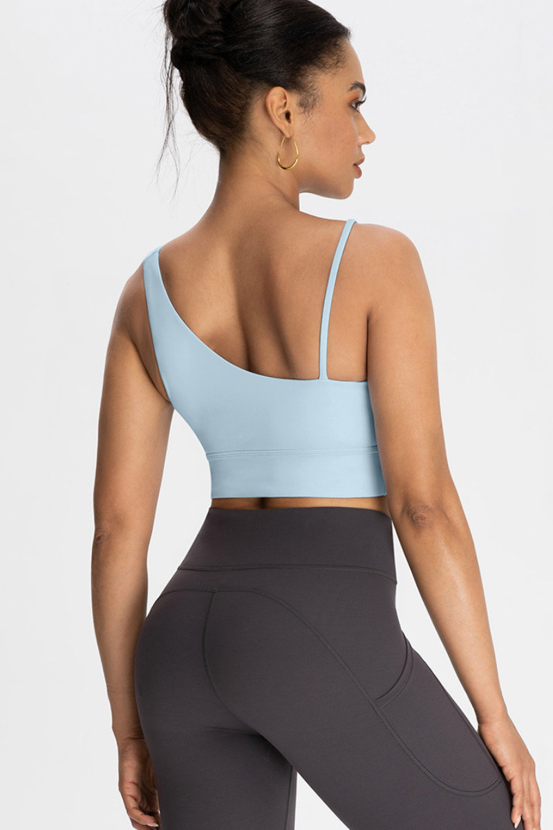 Bra with built-in chest padding and slanted shoulders
