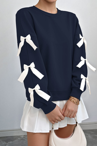 Round-necked, bow-style, red Christmas-themed sweatshirt