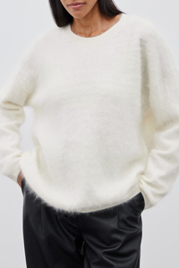 Round-necked plush knit sweater