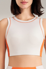 Women's color-blocked sleeveless sports bra.