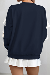 Round-necked, bow-style, red Christmas-themed sweatshirt