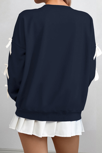 Round-necked, bow-style, red Christmas-themed sweatshirt