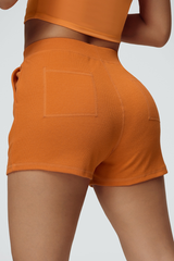 High-waisted, slim-fitting American-style sweatpants