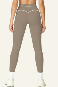 Stripes adorn tight-fitting sport pants.