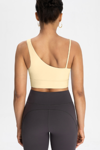 Bra with built-in chest padding and slanted shoulders