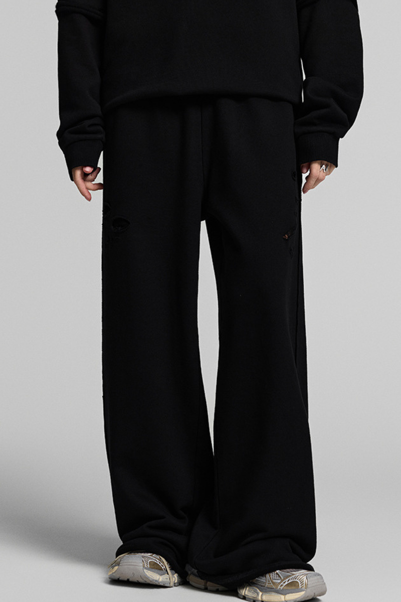 Faded, frayed-edged sweatpants