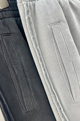 Water-washed, distressed, straight-leg casual pants