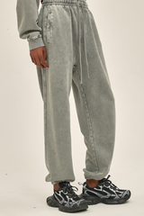 Wax-dyed, distressed, loose-fitting sweatpants