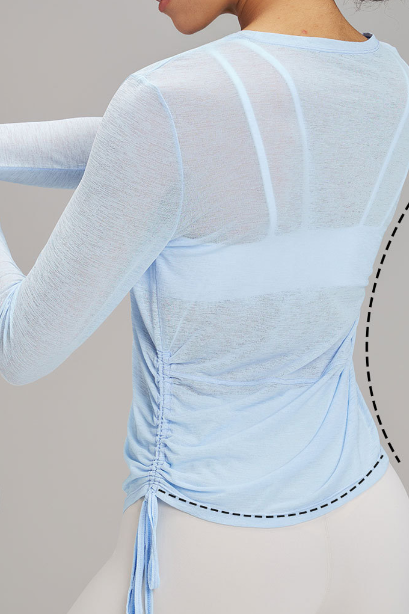 Women's side-seamed drawstring waist long-sleeved shirt.