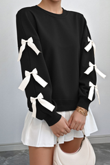 Round-necked, bow-style, red Christmas-themed sweatshirt