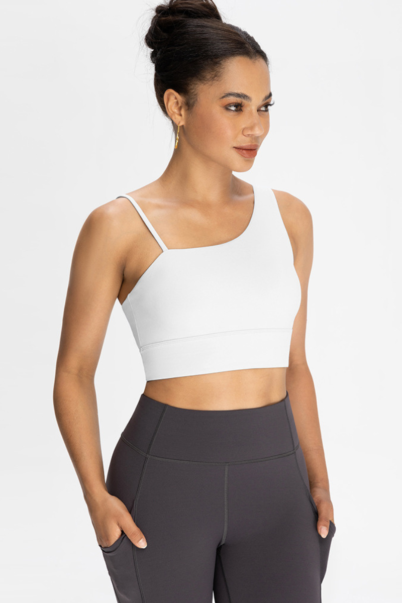 Bra with built-in chest padding and slanted shoulders
